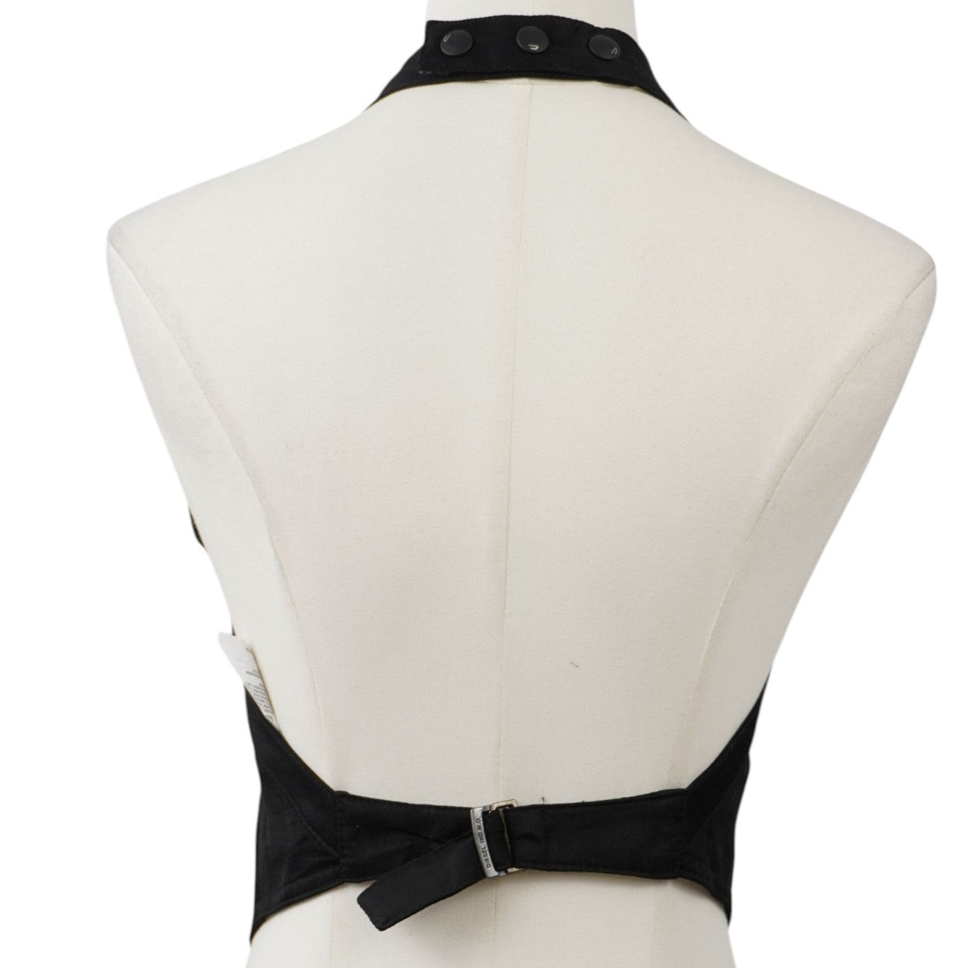 Retro del gilet Diesel vintage con spalline sottili incrociate e schiena scoperta, design minimalista anni 2000.