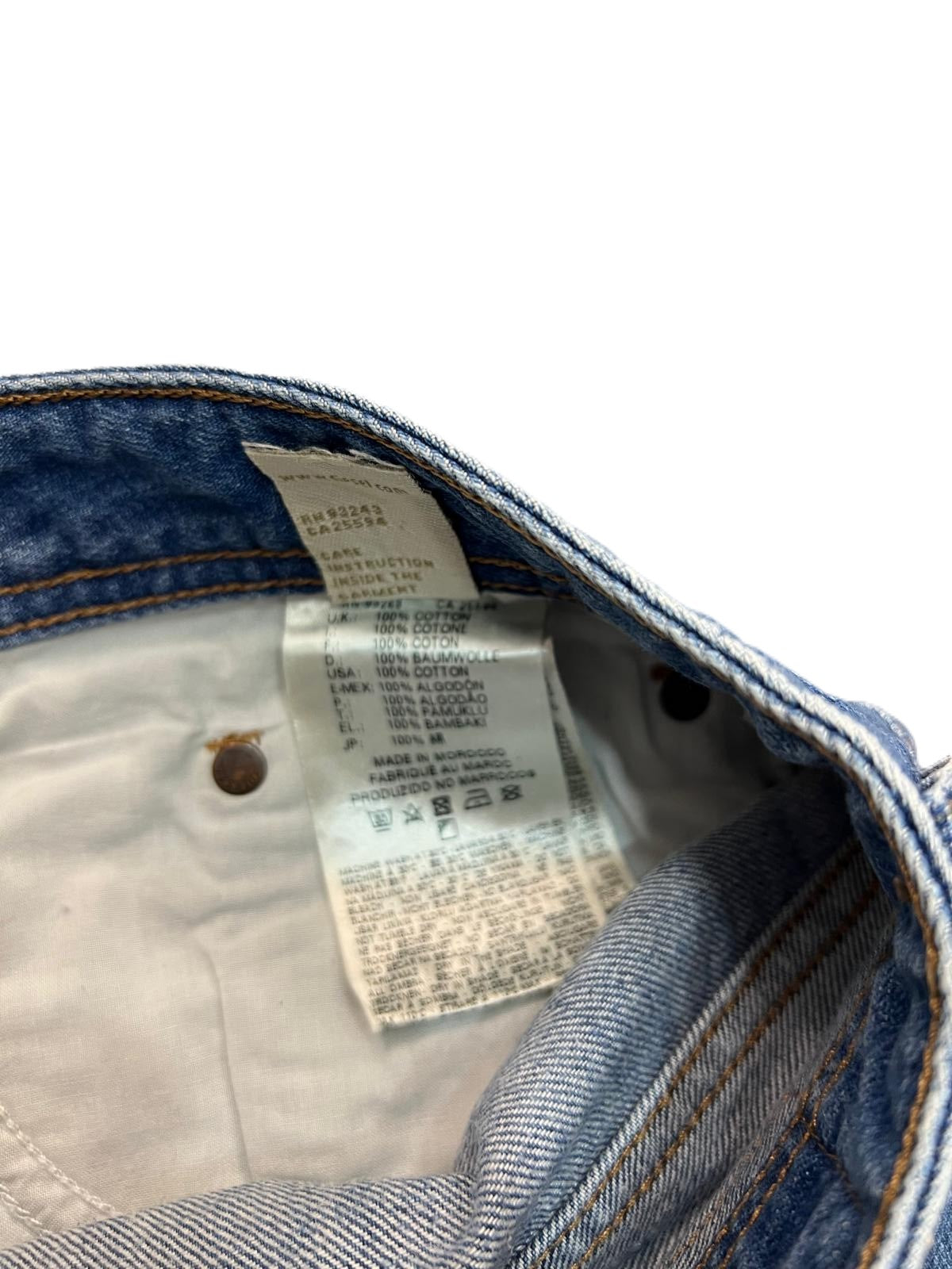 Jeans Diesel Industry uomo taglio Regular Straight in denim blu con lavaggio medio e dettaglio etichetta