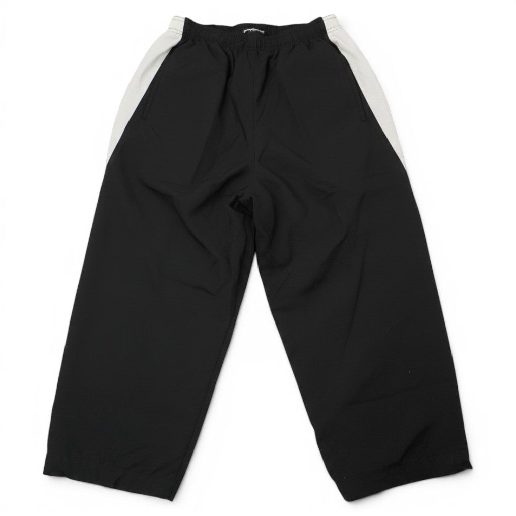 Retro pantaloni a tre quarti uomo Puma in tessuto tecnico nero con inserti bianchi