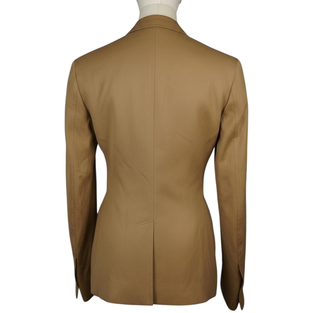 Retro del blazer d'archivio Versus Versace color beige con taglio sagomato a clessidra e spacco centrale.
