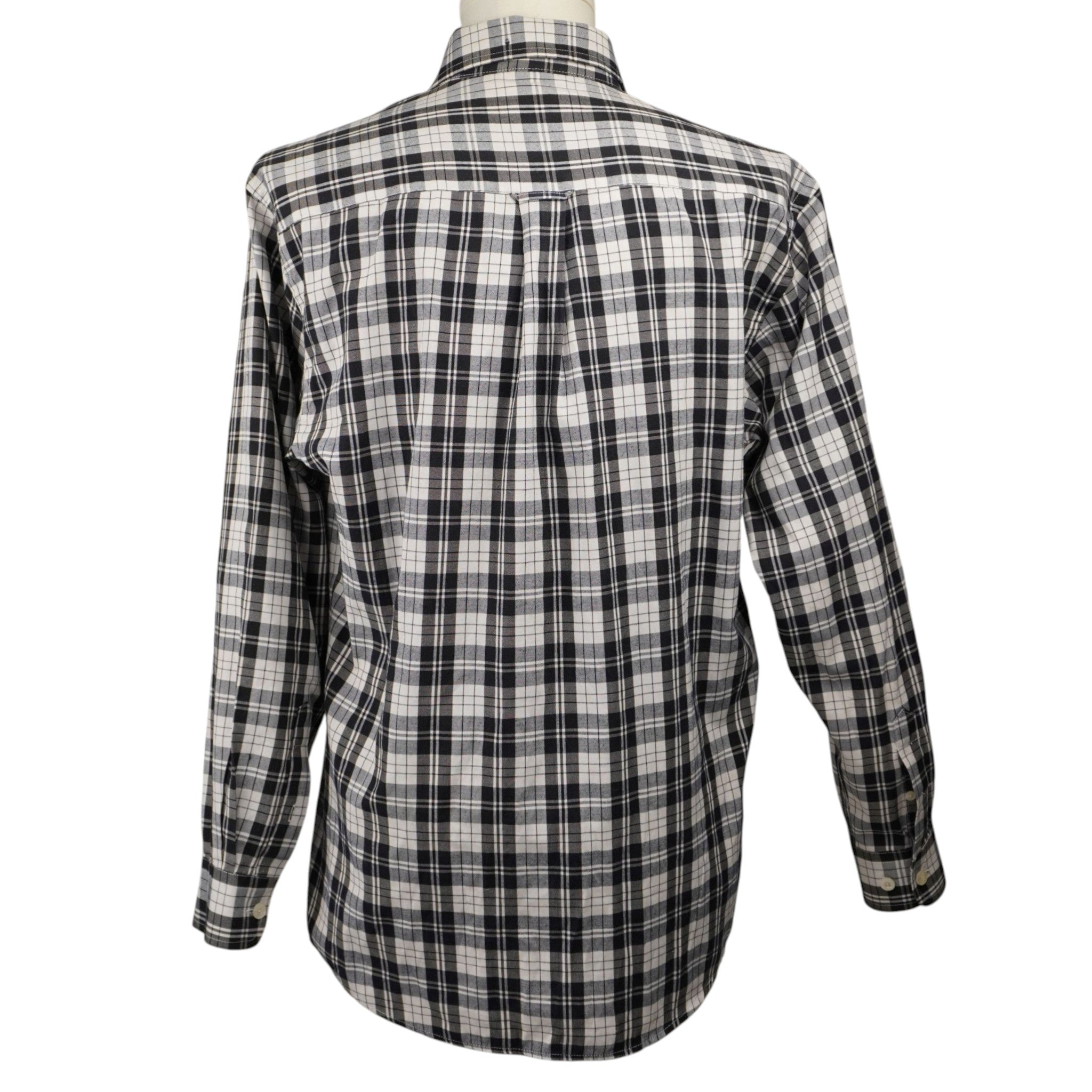 Retro di una camicia vintage Levi's a quadri scozzesi grigio scuro e bianco, vestibilità regolare con piega a cannone posteriore.