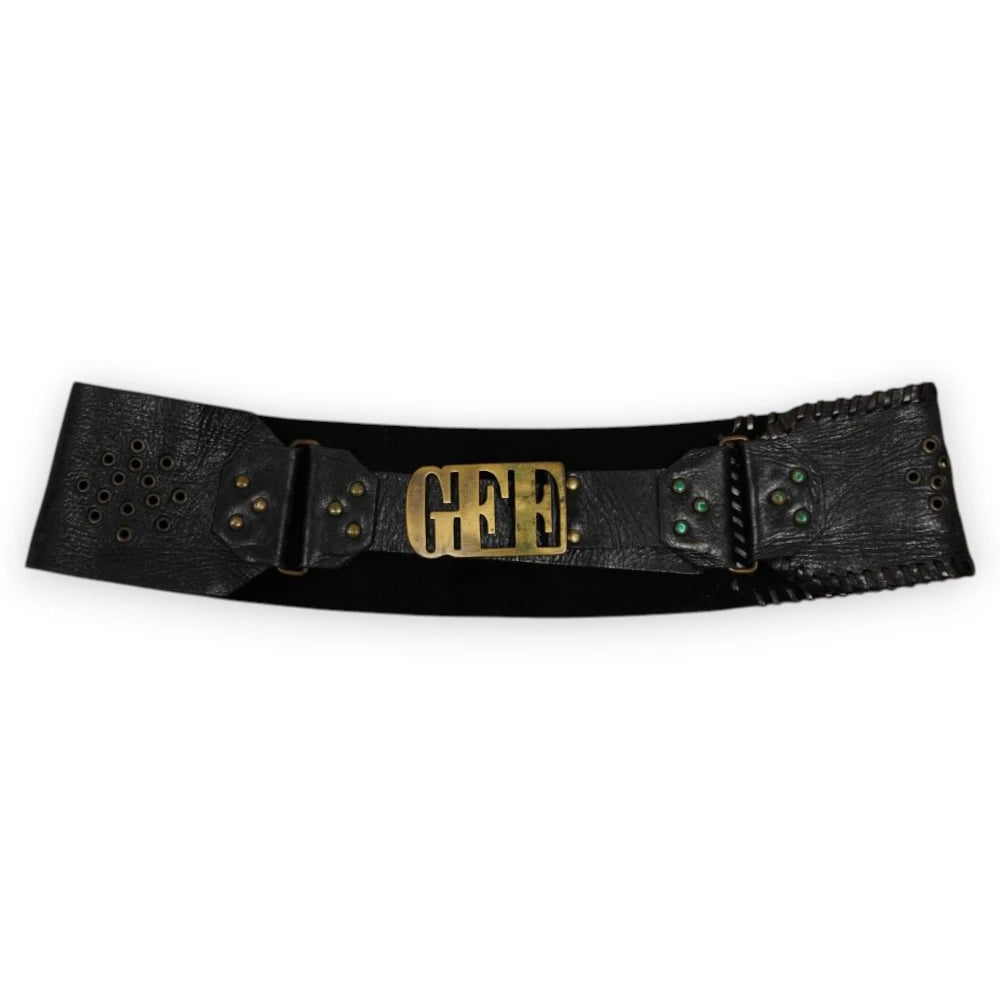 Cintura alta a corsetto vintage Gianfranco Ferré GFF in pelle e camoscio nero con maxi fibbia centrale in ottone, vista frontale.