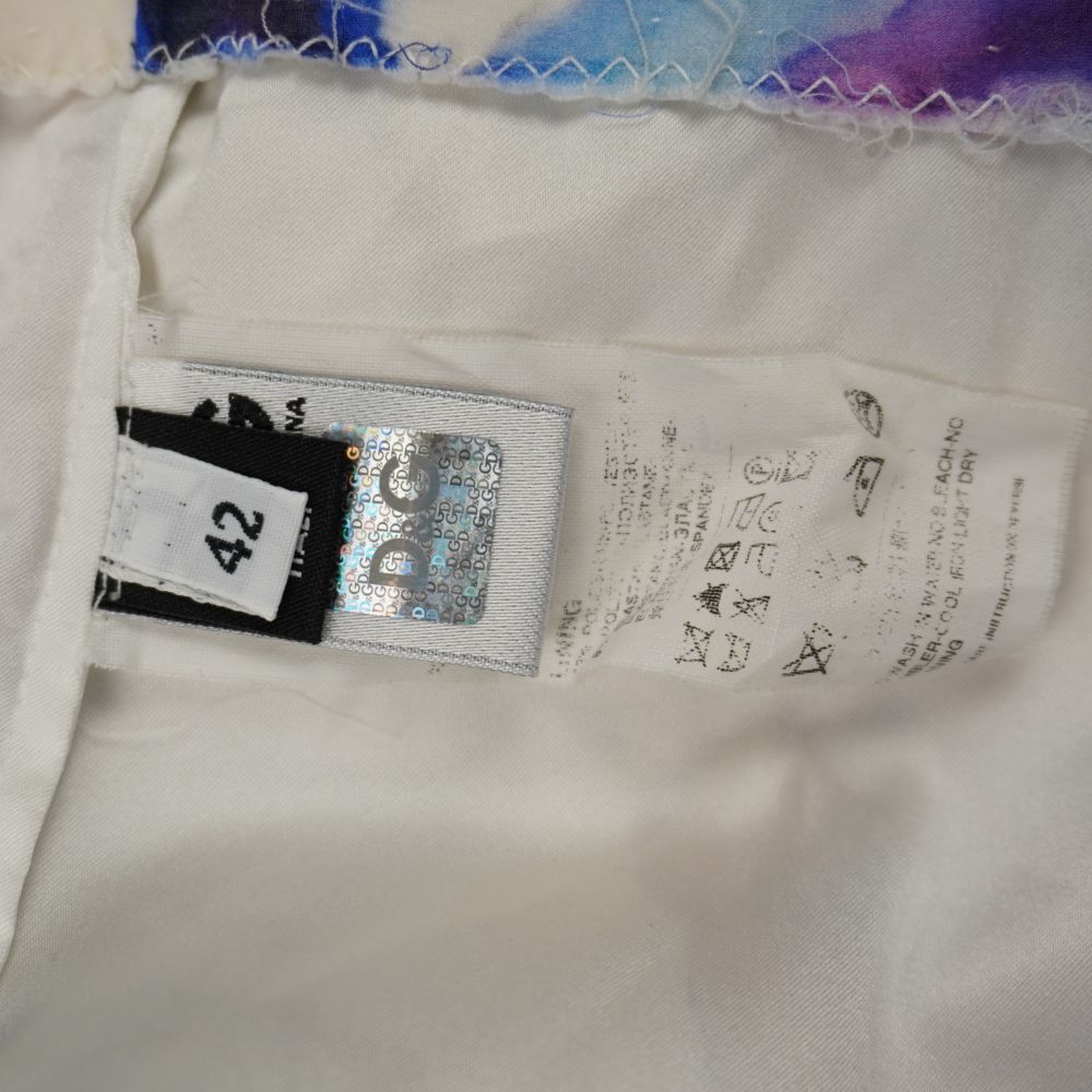 Etichetta interna di lavaggio D&G Dolce e Gabbana con composizione 92 per cento seta e codice articolo SD2012