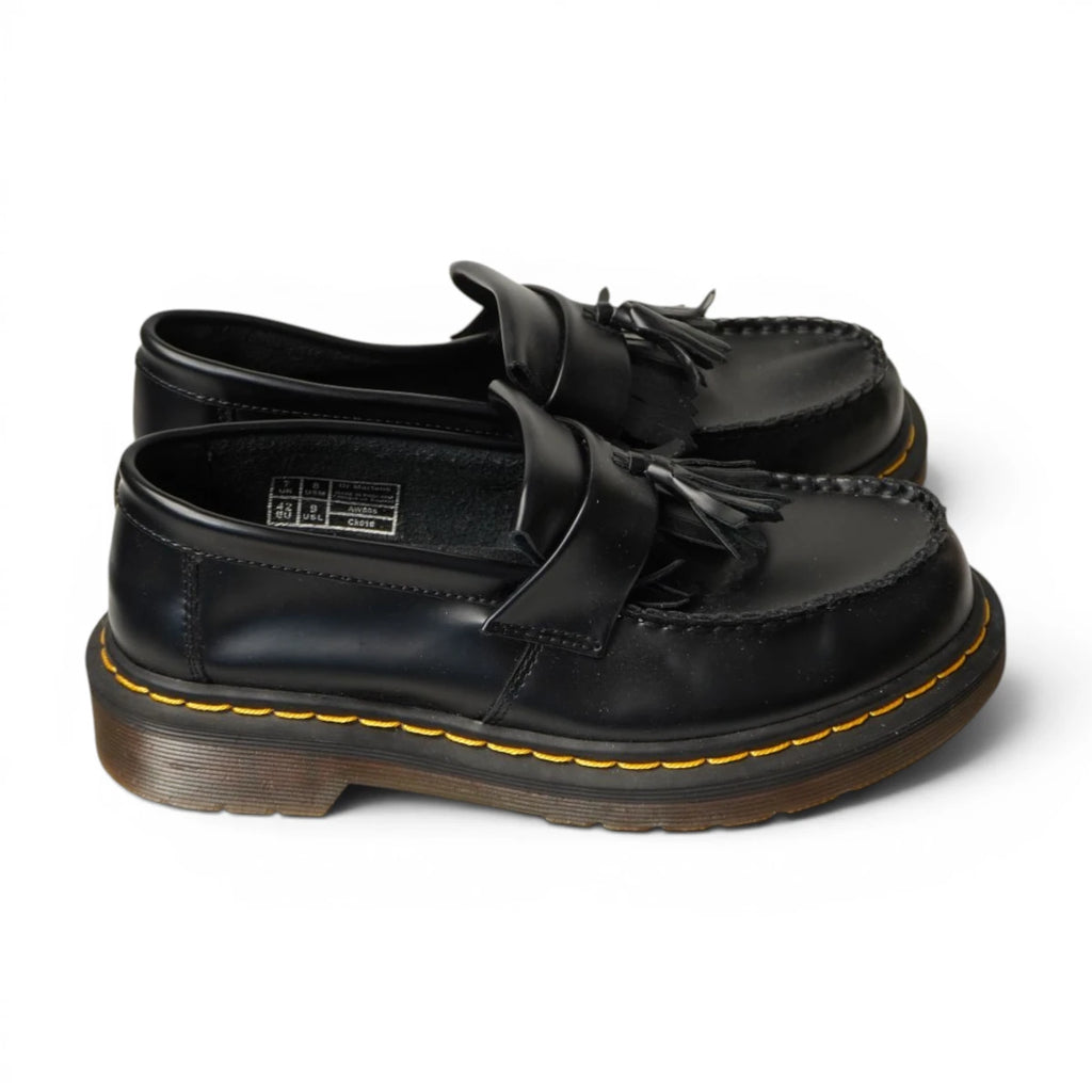 Mocassini Dr. Martens Adrian Made in England neri in pelle liscia visti di profilo laterale