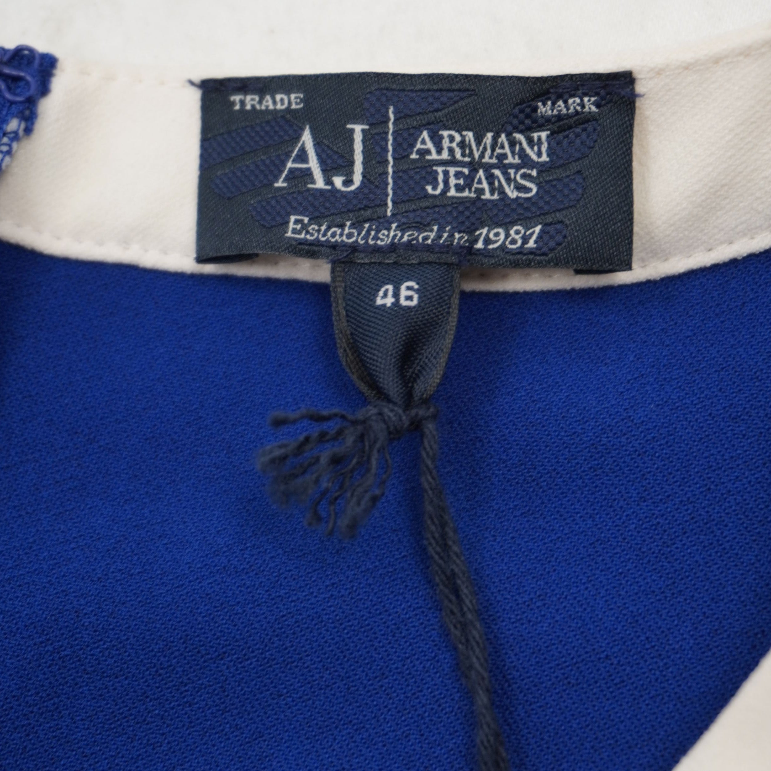 Etichetta originale Armani Jeans Trade Mark nuziale blu con indicazione taglia 46.