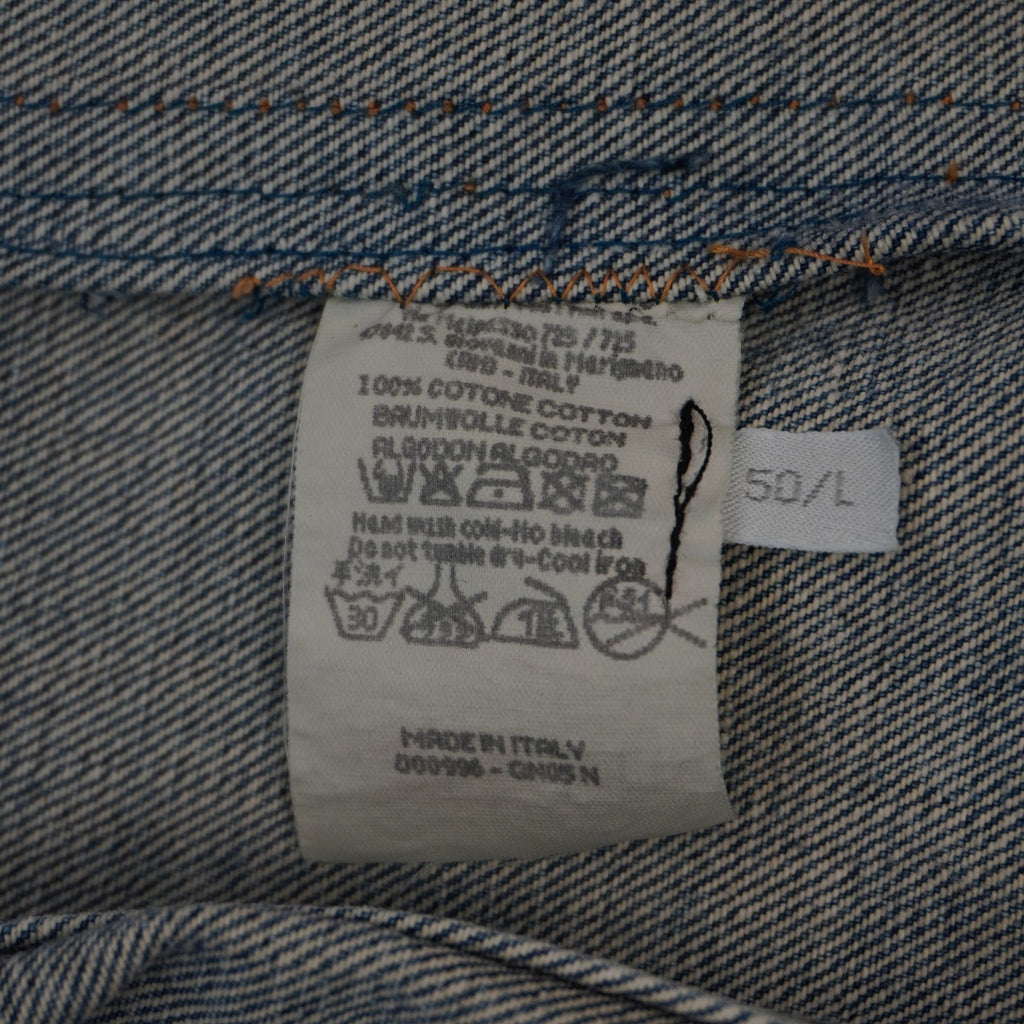 Dettaglio dell'etichetta interna con codici di produzione del Gruppo Gilmar e certificazione Made in Italy.
