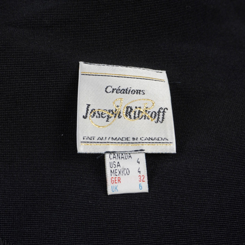 Etichetta originale in tessuto bianco con il logo Joseph Ribkoff che certifica l'autenticità del capo Made in Canada.