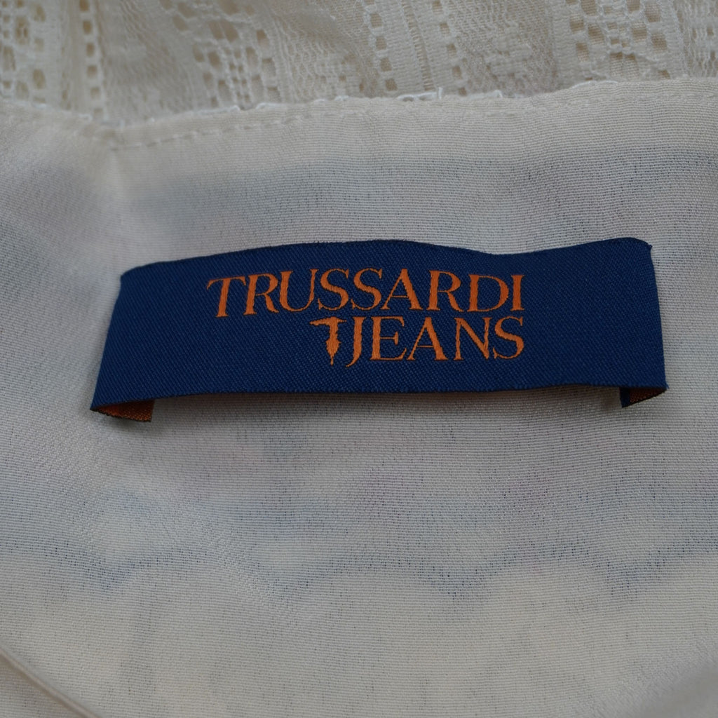 Etichetta interna in tessuto blu notte con logo arancione e simbolo del levriero Trussardi Jeans