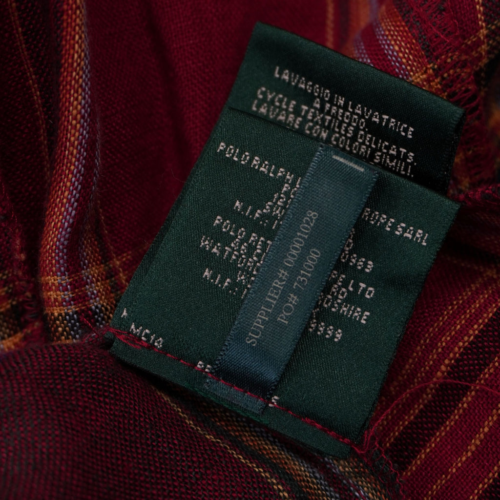 Etichetta interna verde Lauren Ralph Lauren con i codici ufficiali di autenticità Supplier 00001028 e PO 731000.