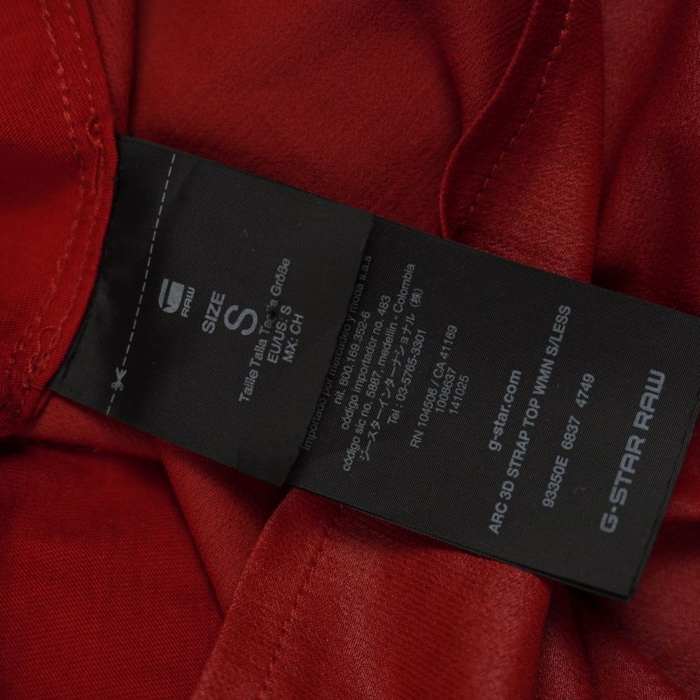 Etichetta interna nera di G-Star Raw che riporta la taglia S, il codice prodotto 93350E e il nome del modello Arc 3D Strap Top Wmn S/Less.