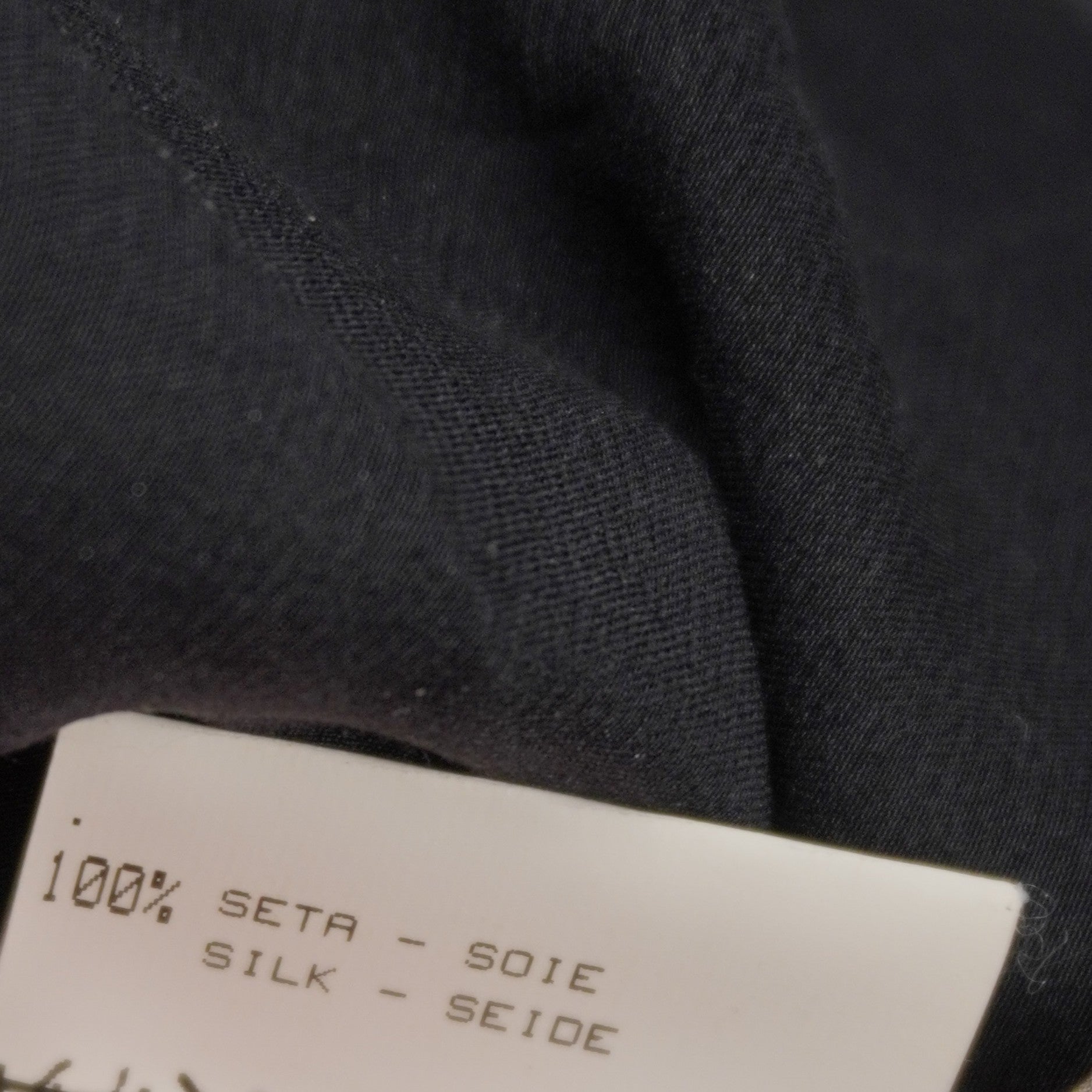 Etichetta interna di lavaggio e composizione della gonna Roberto Cavalli Prima Linea in 100% pura seta.