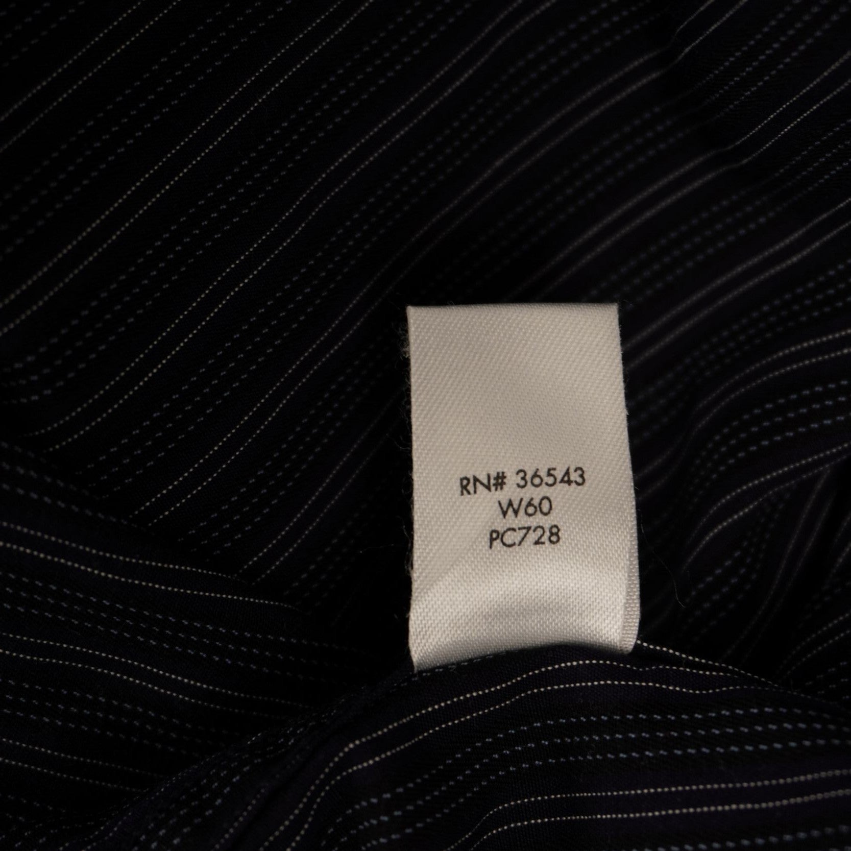 Etichetta interna di composizione in cotone elasticizzato della camicia uomo Calvin Klein