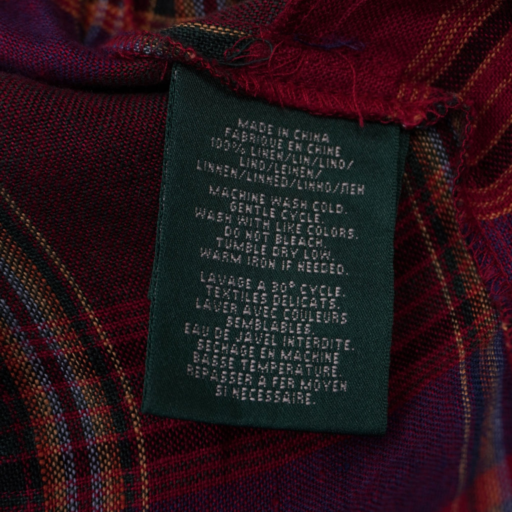 Etichetta interna verde Lauren Ralph Lauren con istruzioni di lavaggio a 30 gradi e composizione 100% lino.