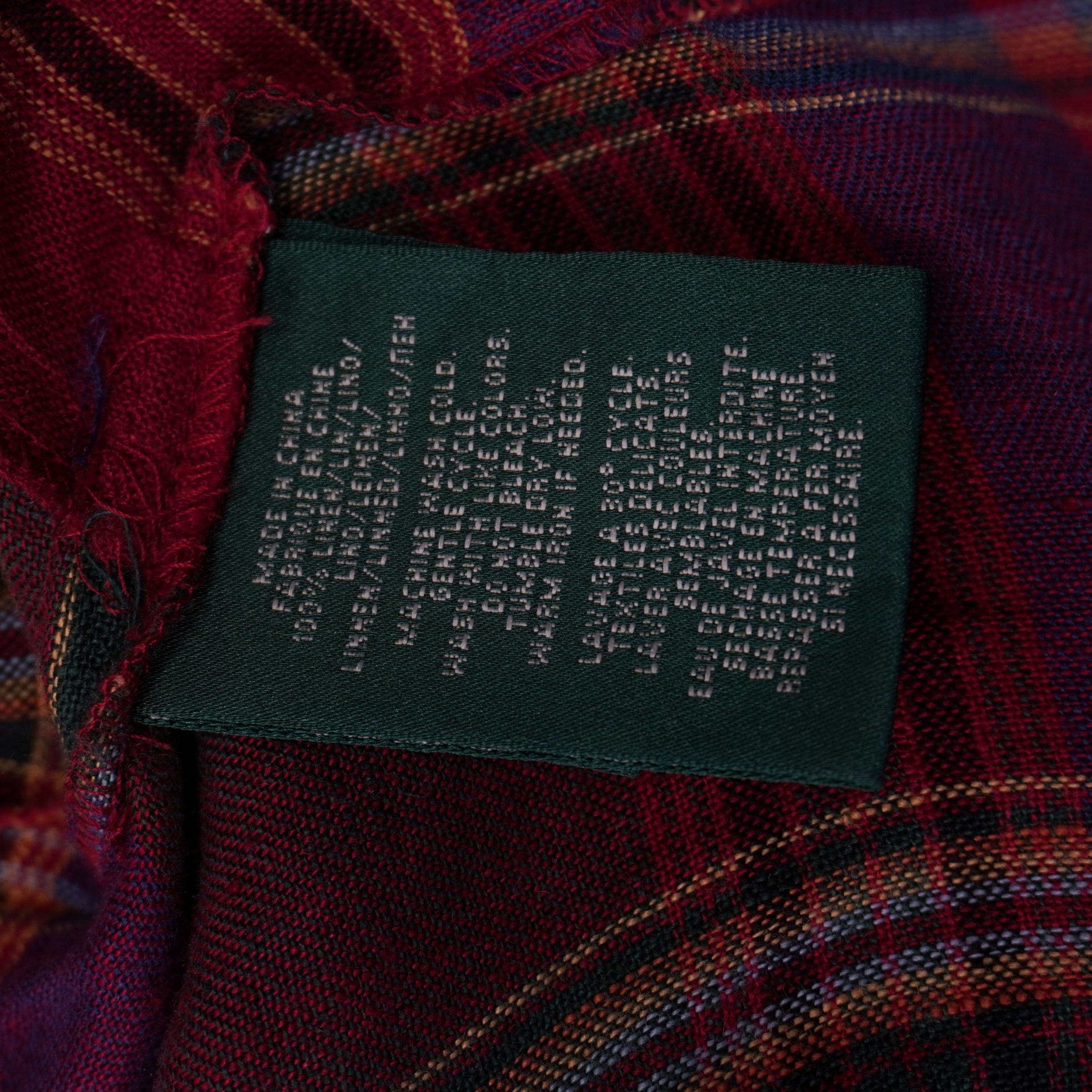 Etichetta interna verde Lauren Ralph Lauren con istruzioni di lavaggio a 30 gradi e composizione 100% lino.
