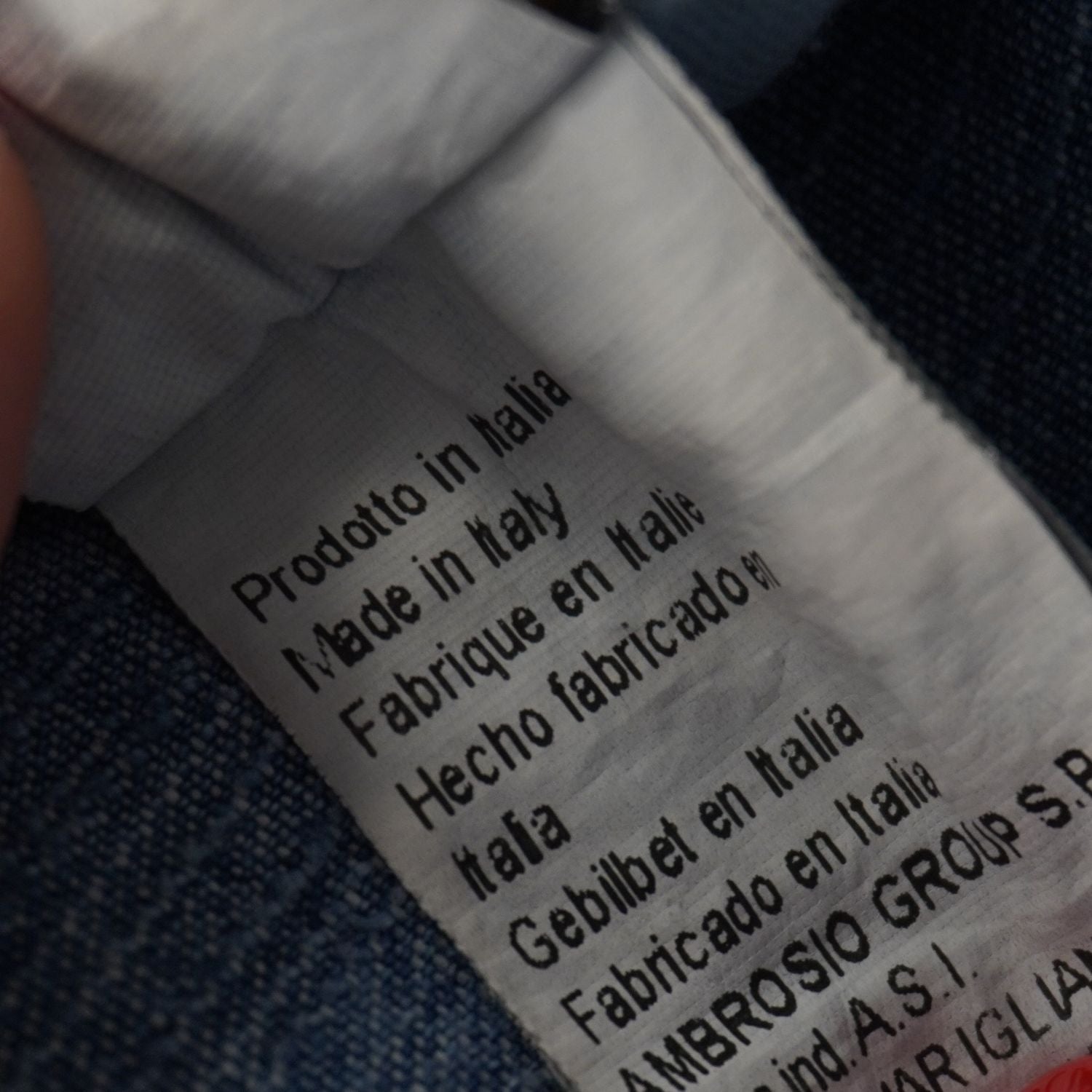 Etichetta interna di produzione d'archivio Made in Italy con indicazione del produttore Ambrosio Group S.p.A.