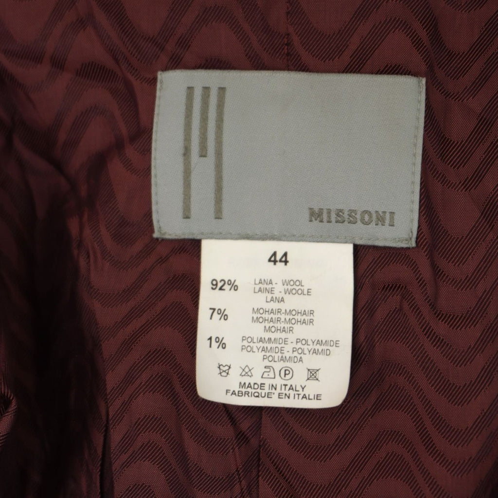 Etichetta originale in tessuto grigio Missoni cucita all'interno della giacca con indicazione della taglia 44 IT.