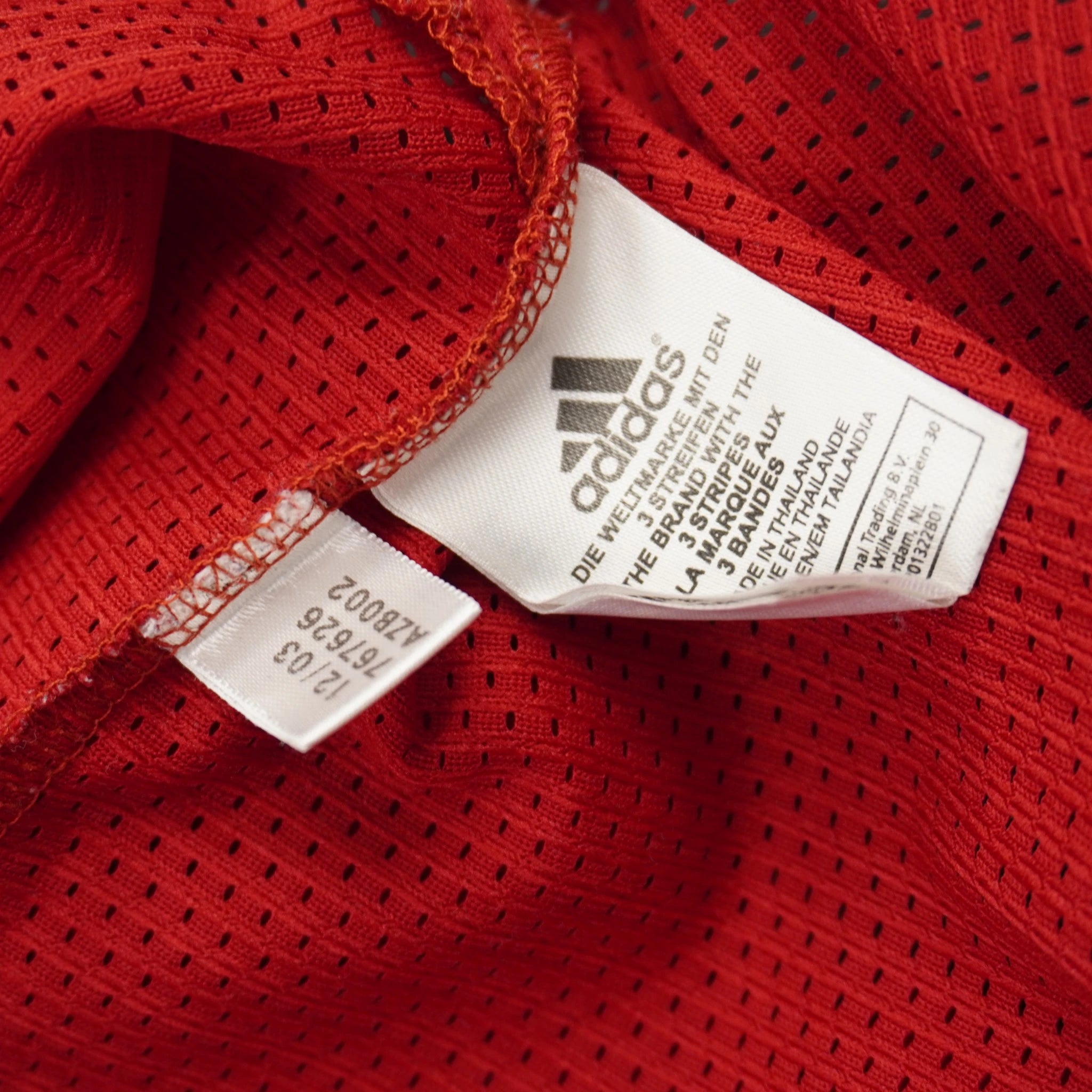 Etichetta interna di autenticità Adidas AZ8002 con codice di produzione anno 2003
