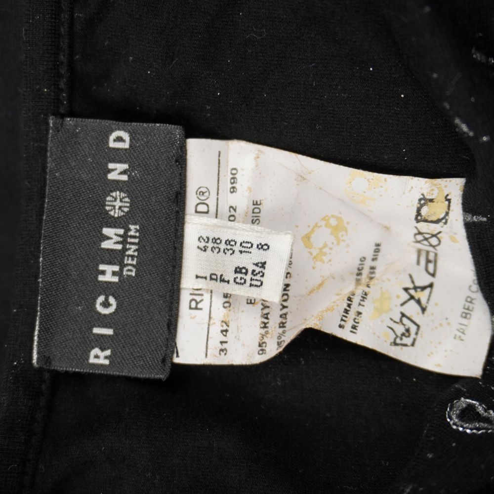 Etichetta originale Richmond Denim prodotta da Falber Confezioni con taglia italiana 42 e codici modello.