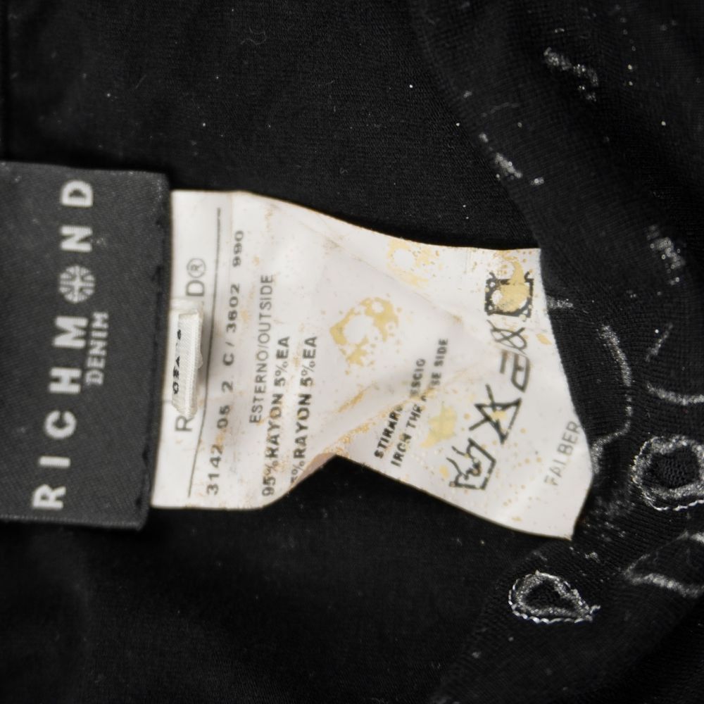 Etichetta originale Richmond Denim prodotta da Falber Confezioni con taglia italiana 42 e codici modello.