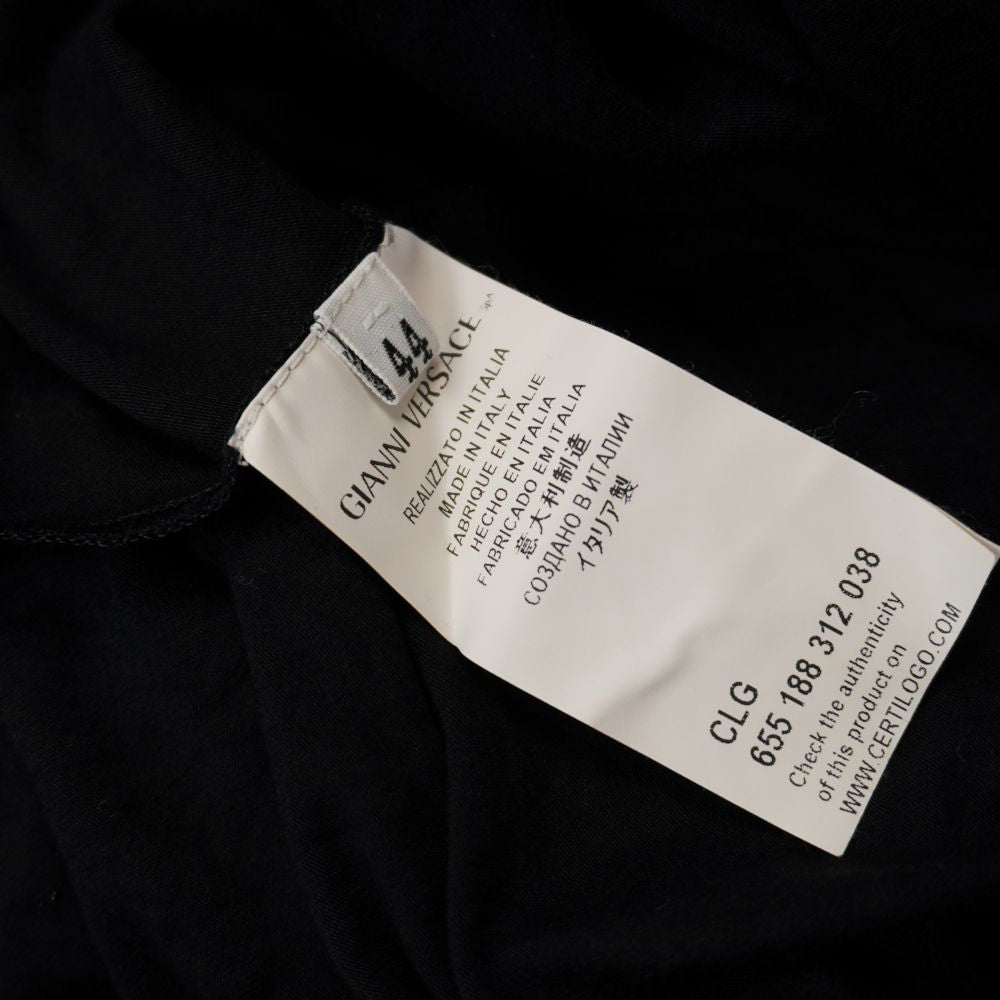 Etichetta di autenticità Gianni Versace / Versace Collection con indicazione taglia italiana 44, dicitura Made in Italy e codice a barre anticontraffazione Certilogo CLG.
