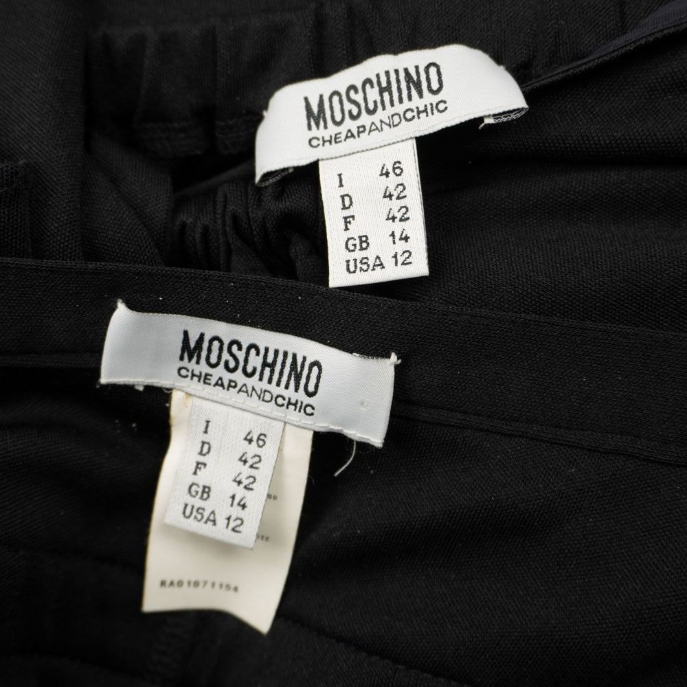 Etichette originali Moschino Cheap and Chic con indicazione della taglia italiana 46.