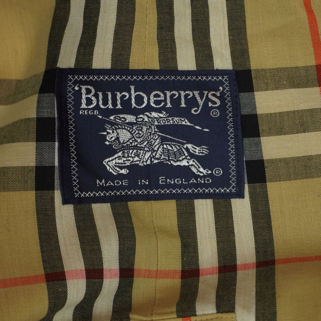 Etichetta blu d'archivio Burberrys' London con il cavaliere ricamato su fodera a motivo Nova Check.