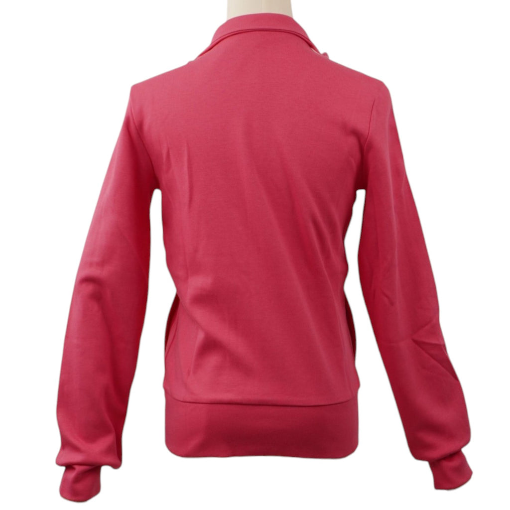 Vista posteriore della felpa rosa Adidas da donna a collo alto indossata su manichino.