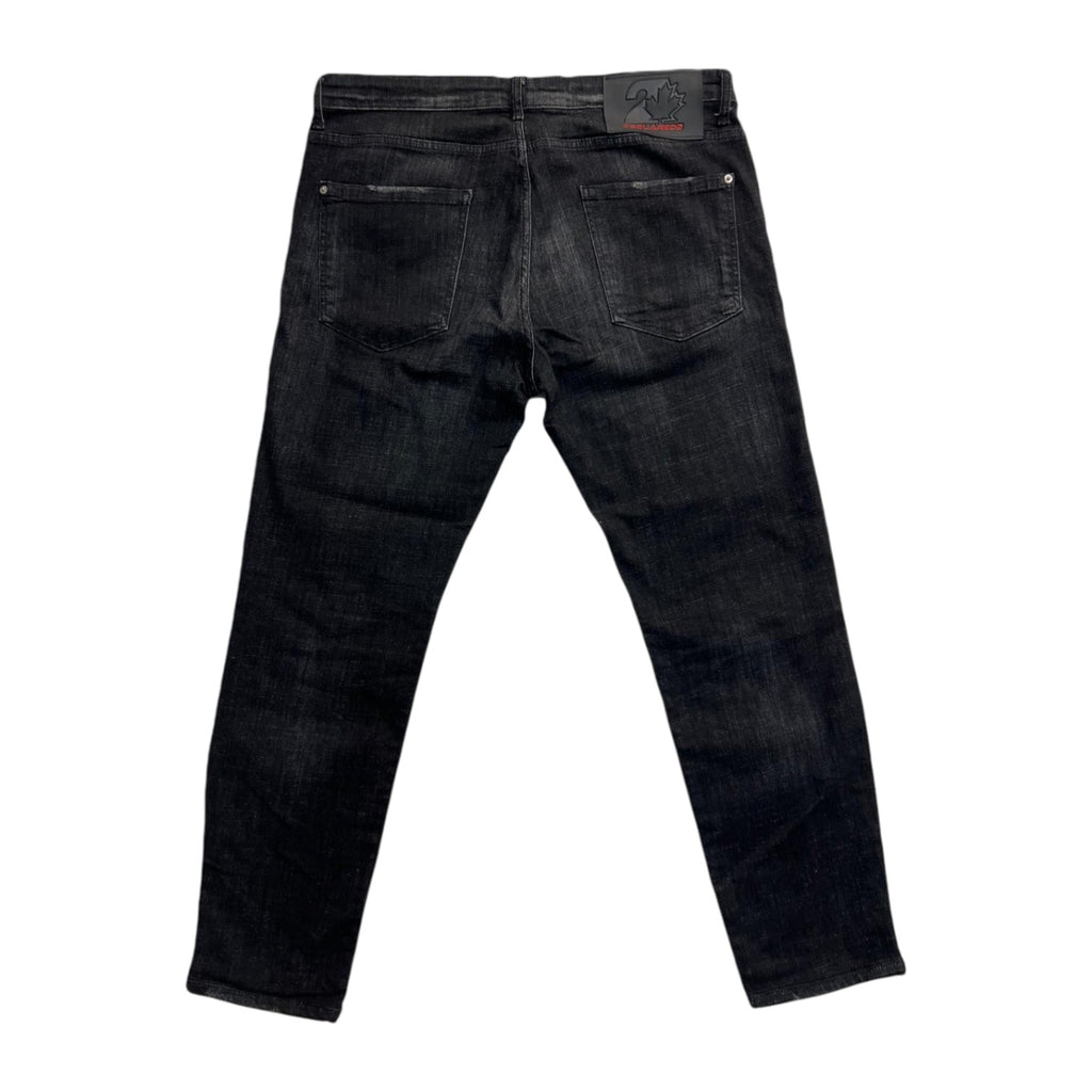 Vista posteriore intera dei jeans neri Dsquared2 con taglio slim affusolato e tasche posteriori.