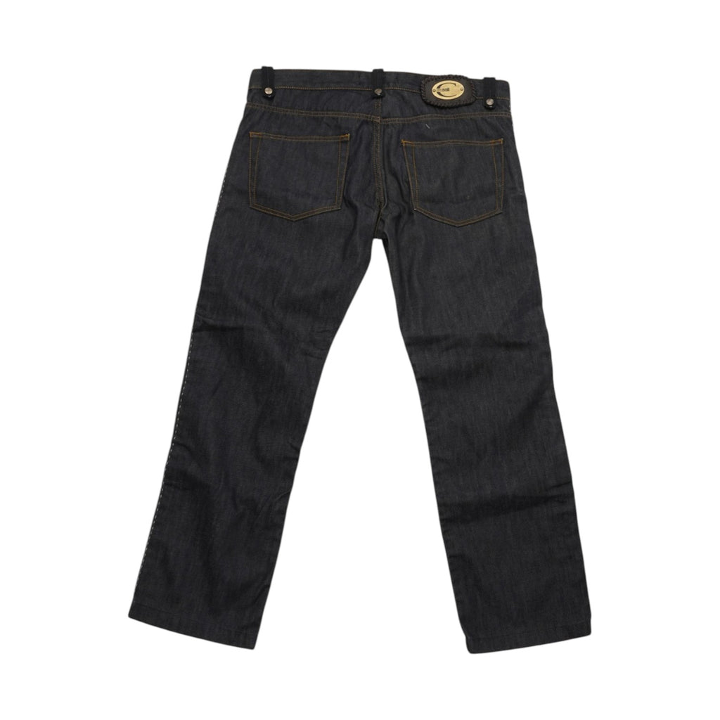 Vista posteriore intera dei jeans d'archivio Just Cavalli, che evidenzia il taglio regolare del bacino e la disposizione delle tasche posteriori.