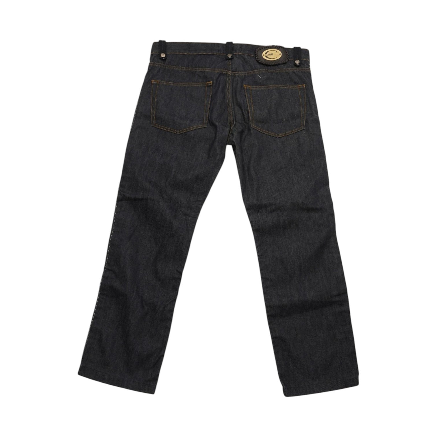 Vista posteriore intera dei jeans d'archivio Just Cavalli, che evidenzia il taglio regolare del bacino e la disposizione delle tasche posteriori.