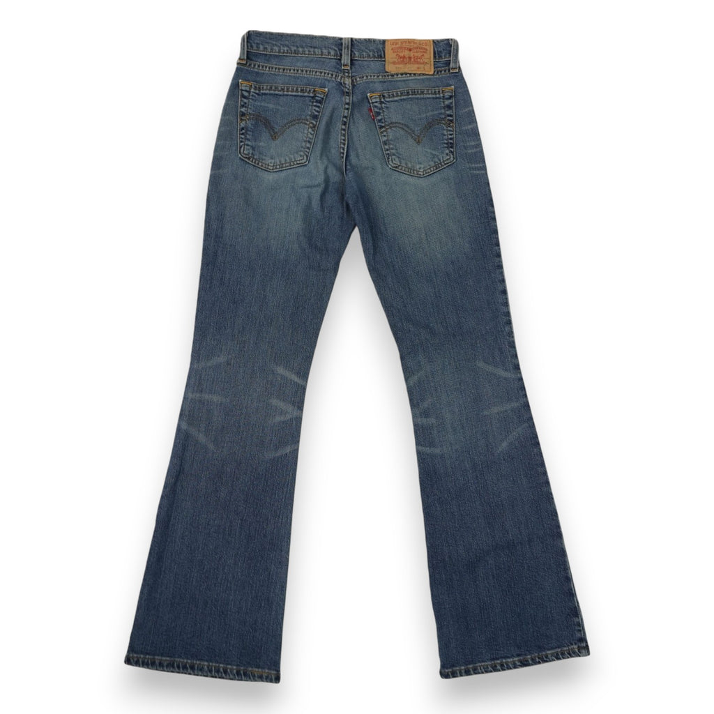 Vista posteriore completa dei jeans svasati Levi's 529 che mostra il taglio bootcut e le tasche sul retro.