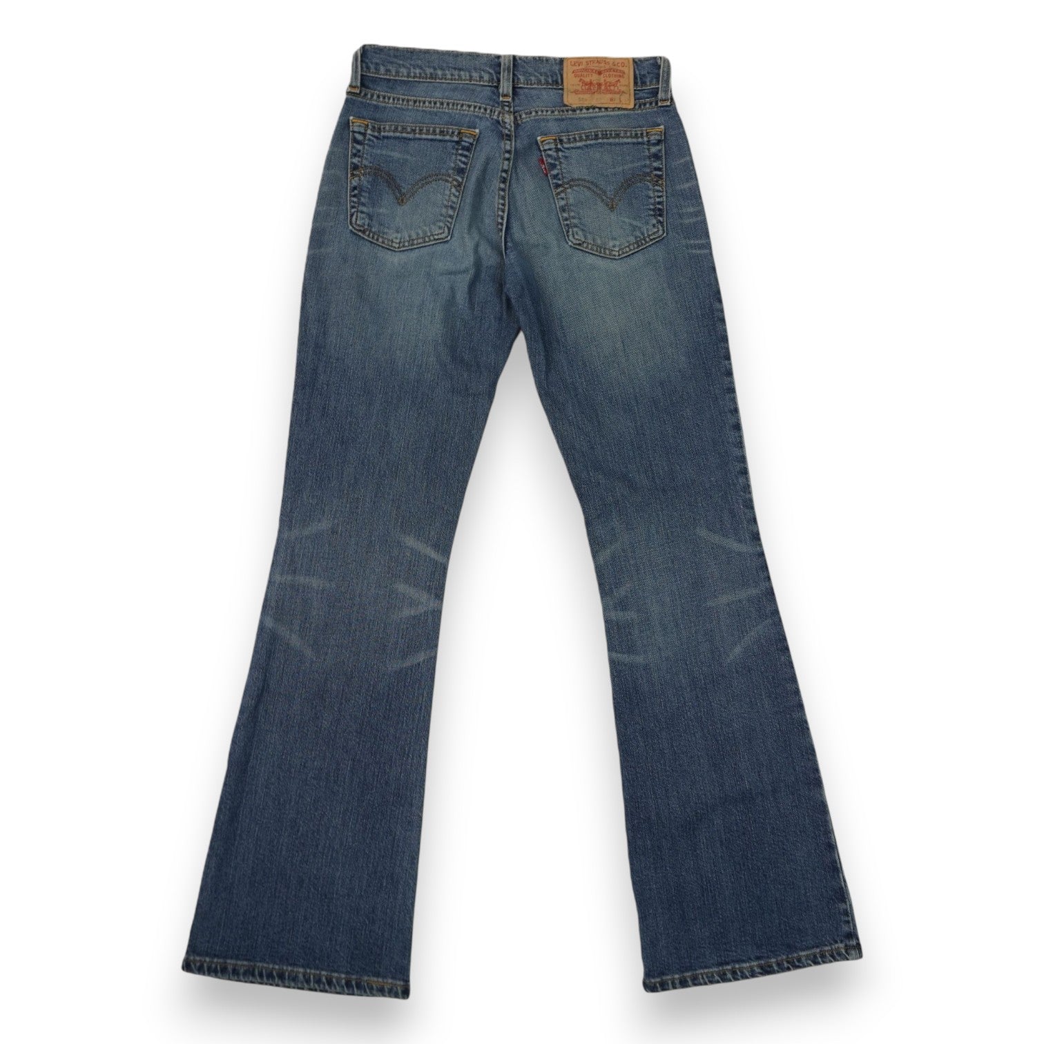 Vista posteriore completa dei jeans svasati Levi's 529 che mostra il taglio bootcut e le tasche sul retro.