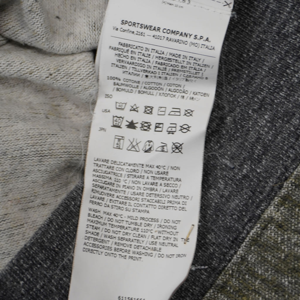 Etichetta di composizione interna maglione Stone Island 100% cotone Made in Italy.