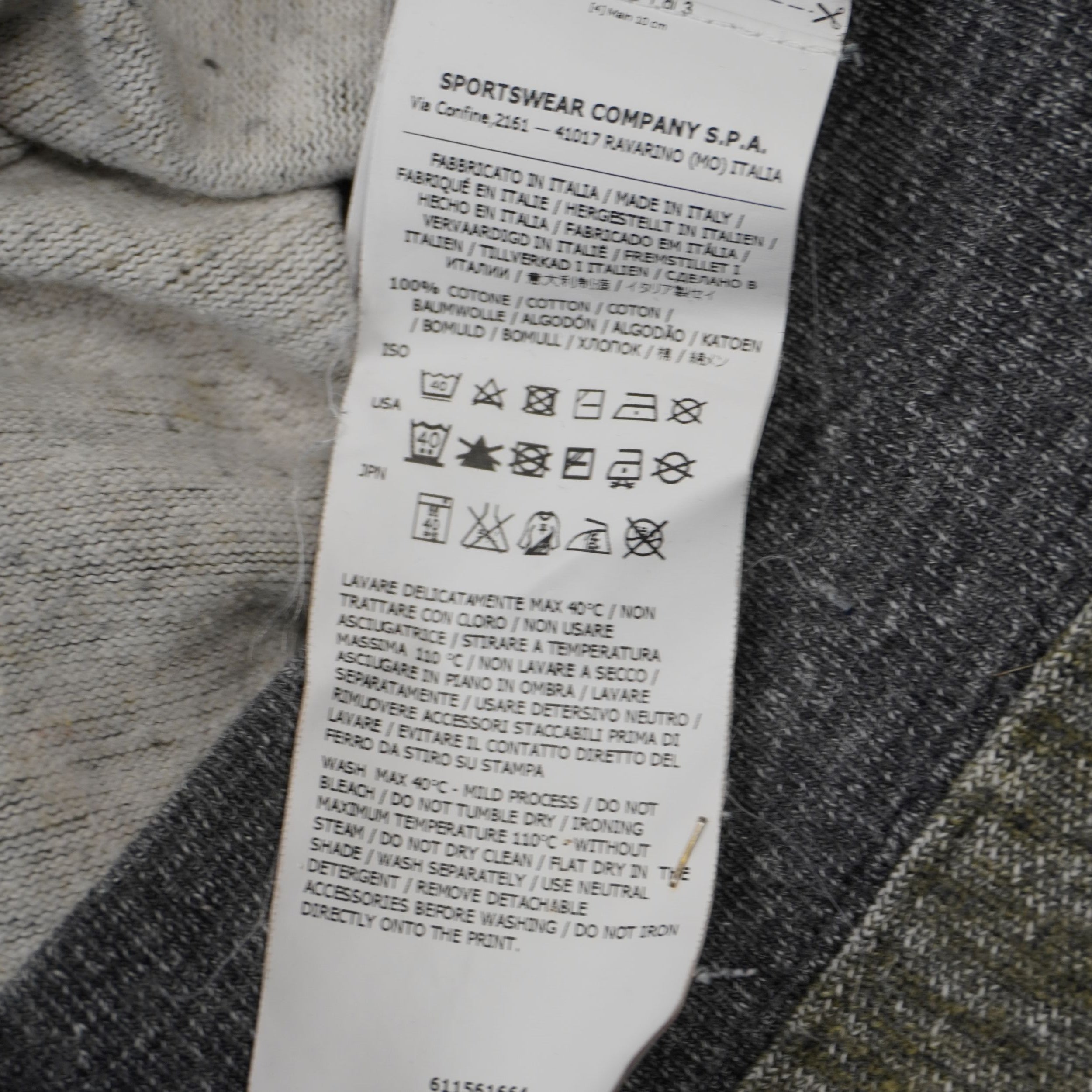 Etichetta di composizione interna maglione Stone Island 100% cotone Made in Italy.