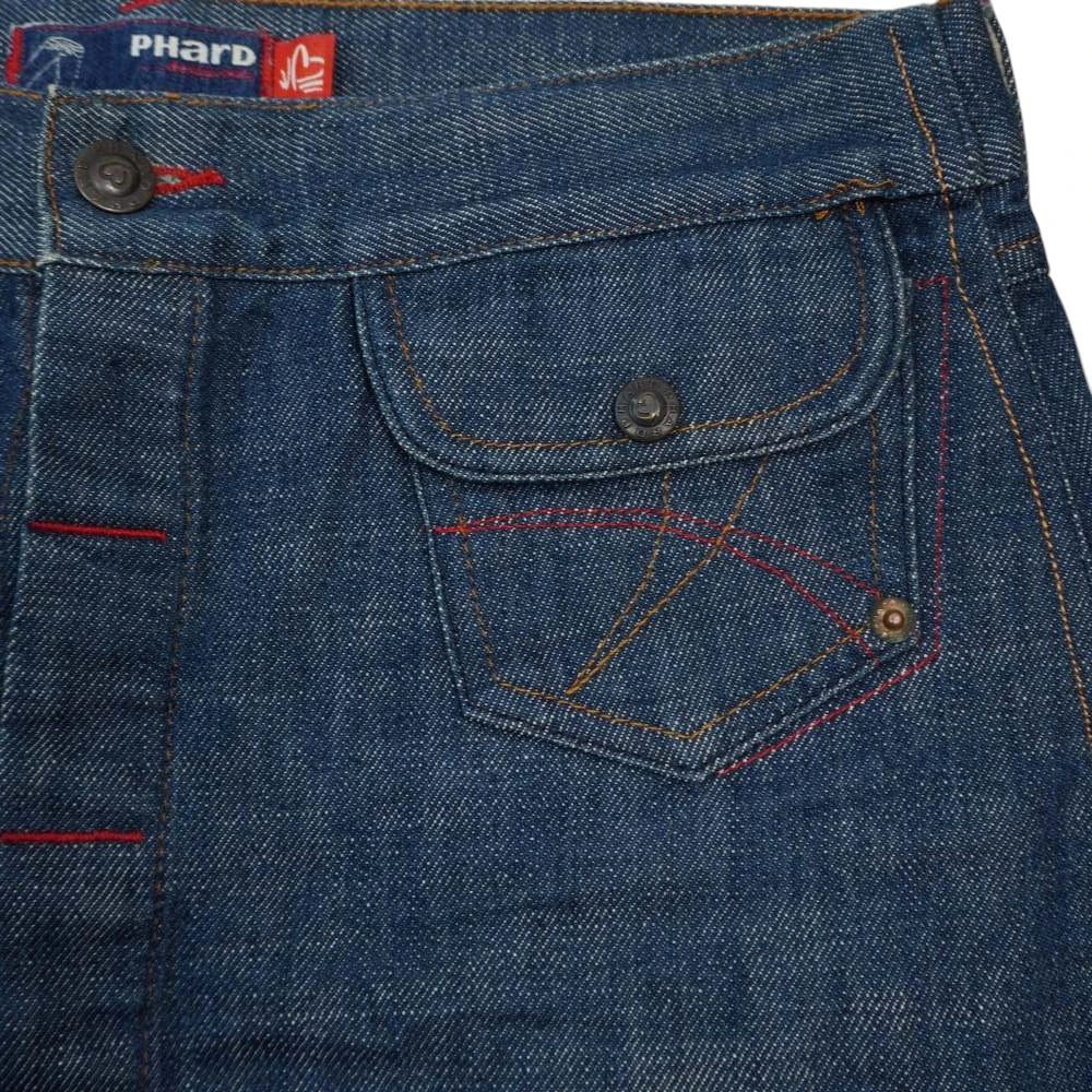 Zoom sulla tasca della gonna jeans Phard con ricami geometrici rossi e ocra e bottone logato
