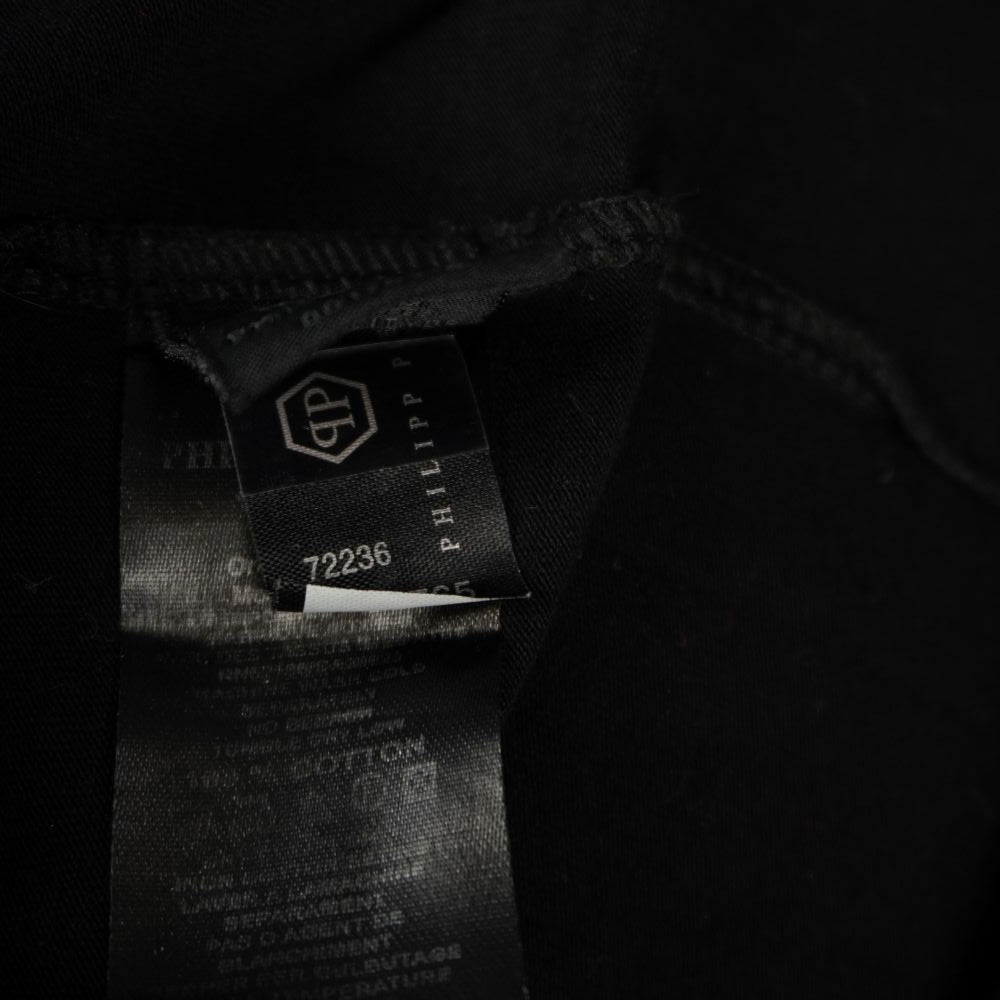 Etichetta interna anticontraffazione con ologramma cangiante e numero seriale Philipp Plein