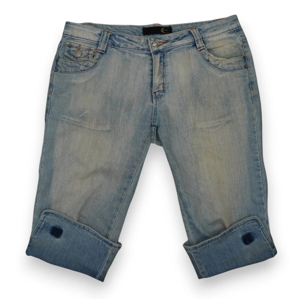 Pantaloni capri Just Cavalli originali da donna in denim chiaro stretch a tre quarti con maxi risvolto sul fondo gamba.