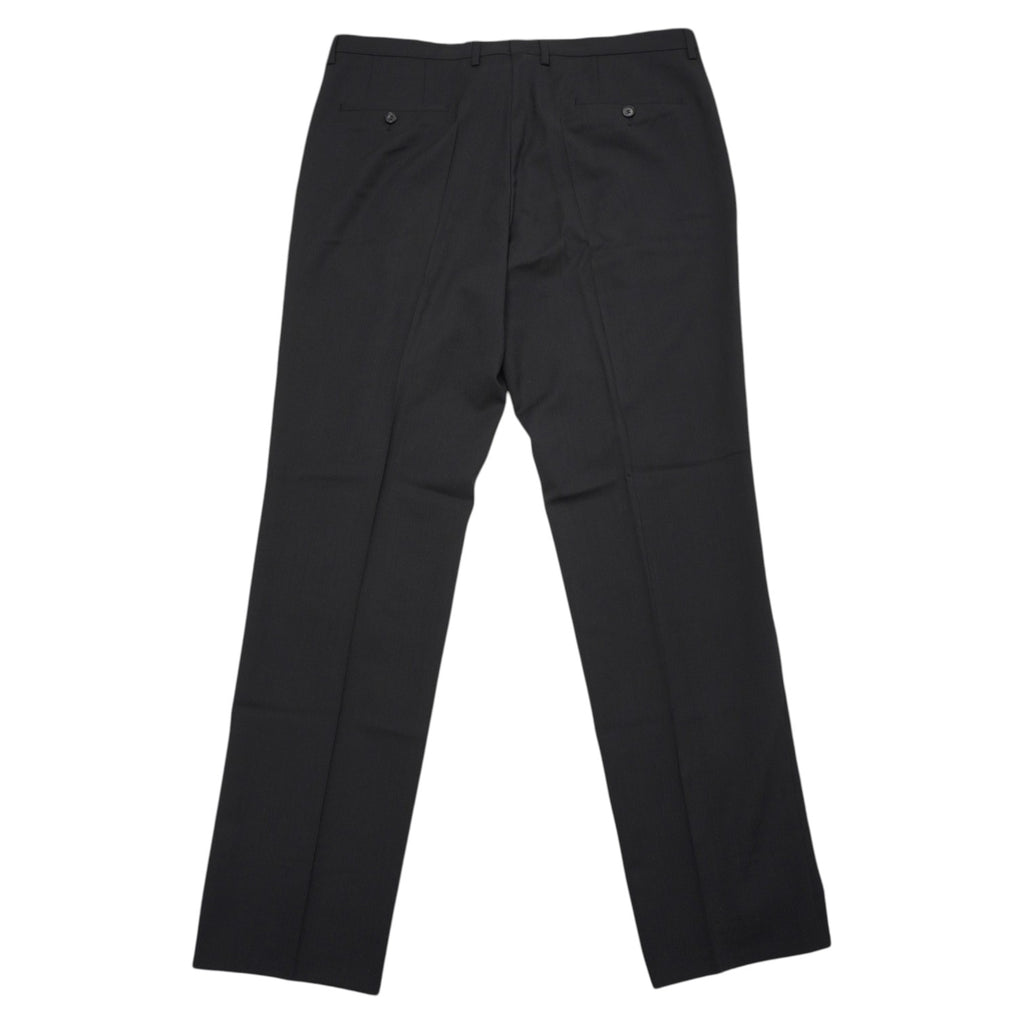 Vista posteriore completa dei pantaloni sartoriali neri BOSS con focus sul posizionamento delle tasche a filetto.