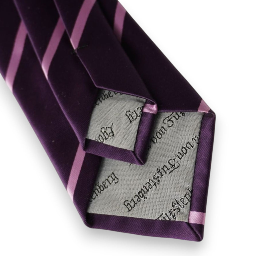 Fodera interna grigio argento jacquard con logo in corsivo Egon von Fürstenberg sul retro della pala principale.