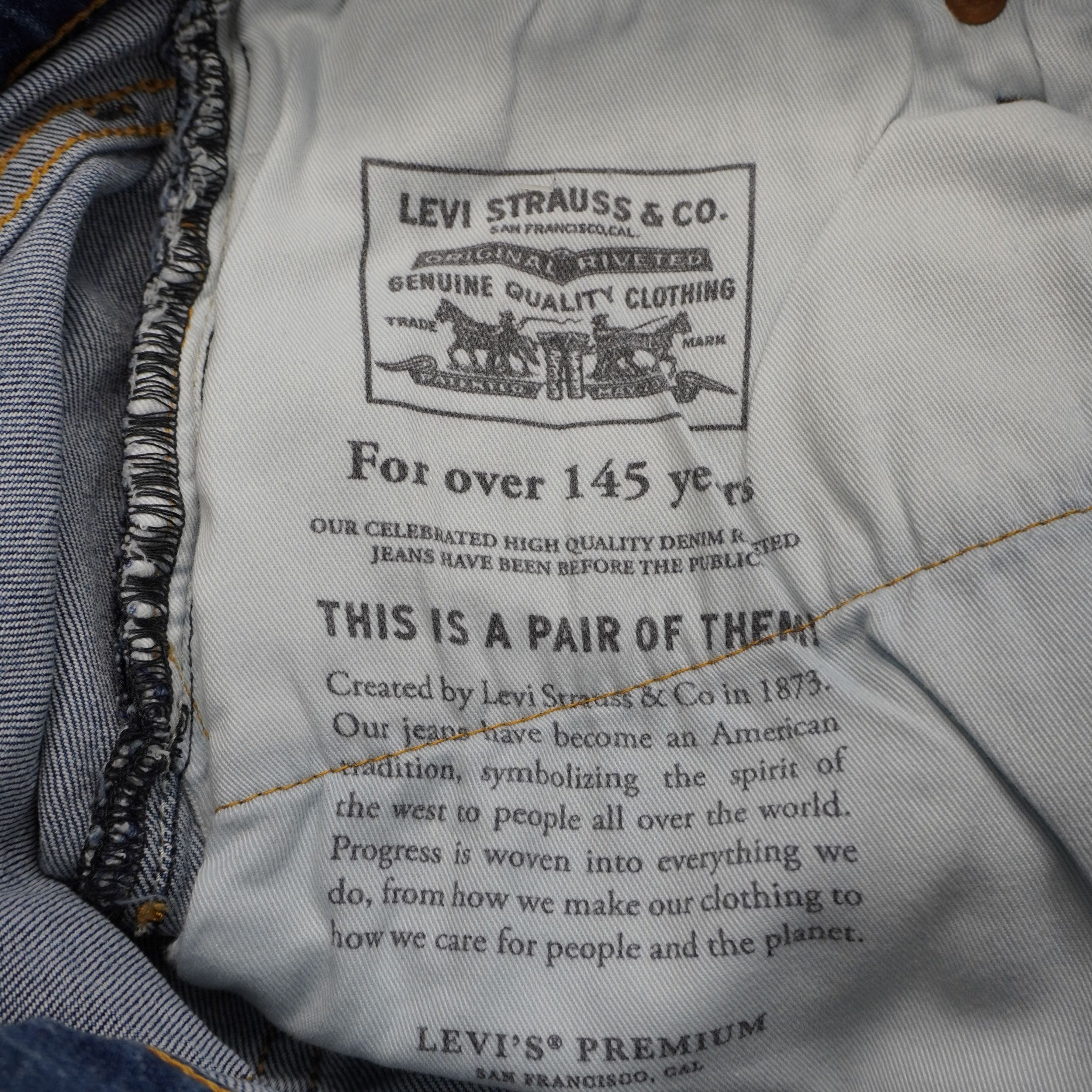 Stampa vintage sulla fodera della tasca interna che certifica la storia e l'autenticità della linea Levi's Premium.