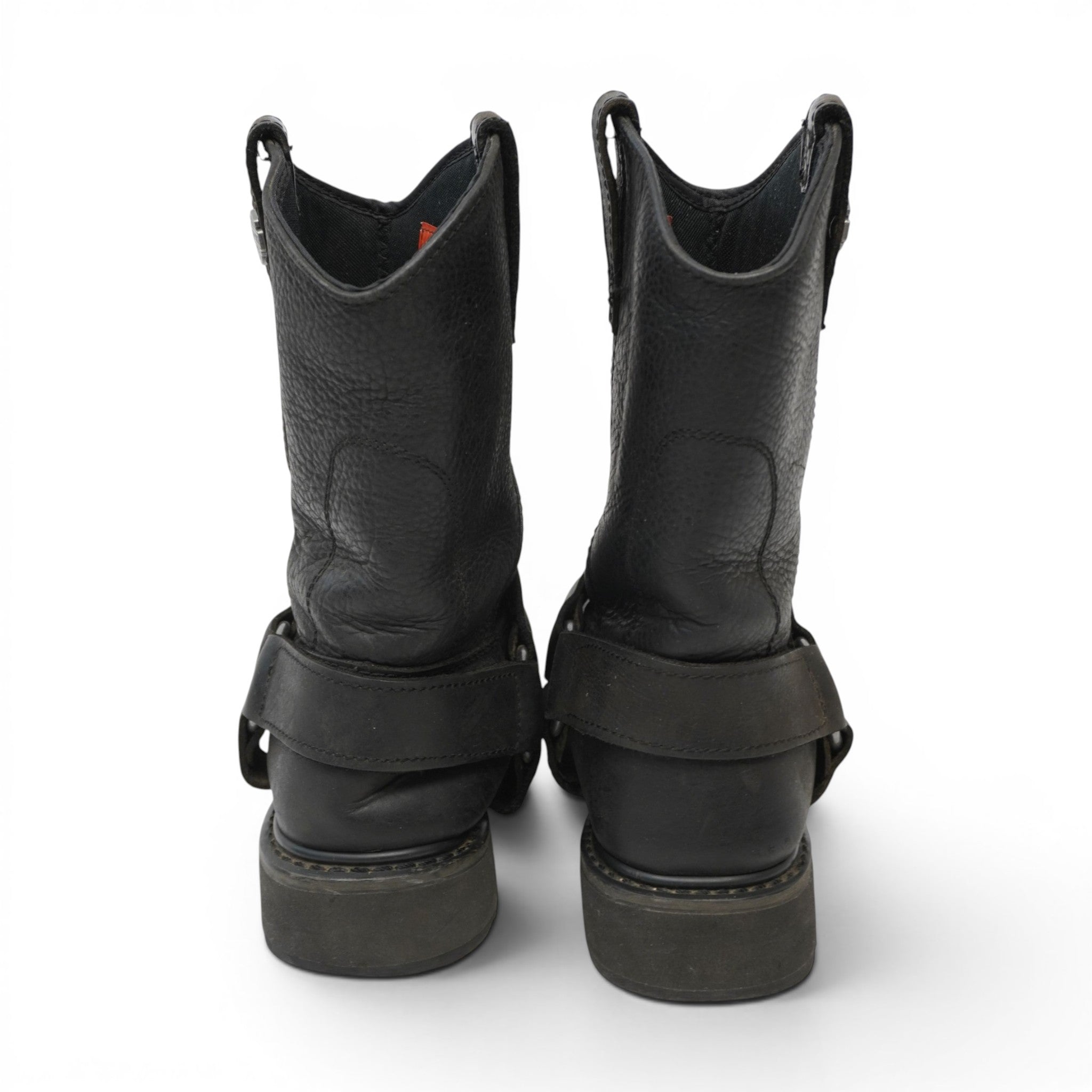 Vista posteriore degli stivali da moto Harley-Davidson con focus sul tallone e sulle cinghie harness in pelle.