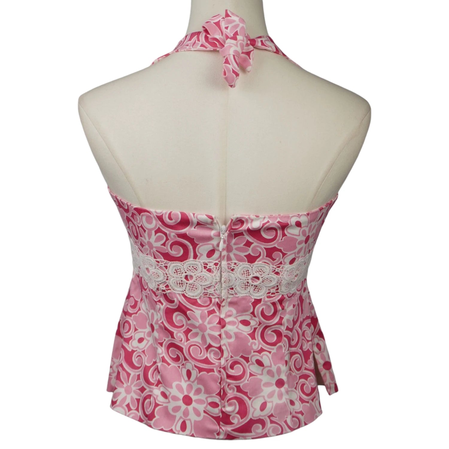 Vista posteriore del top halter Luisa Spagnoli con allacciatura dietro al collo, cerniera invisibile centrale e inserto in pizzo continuo.